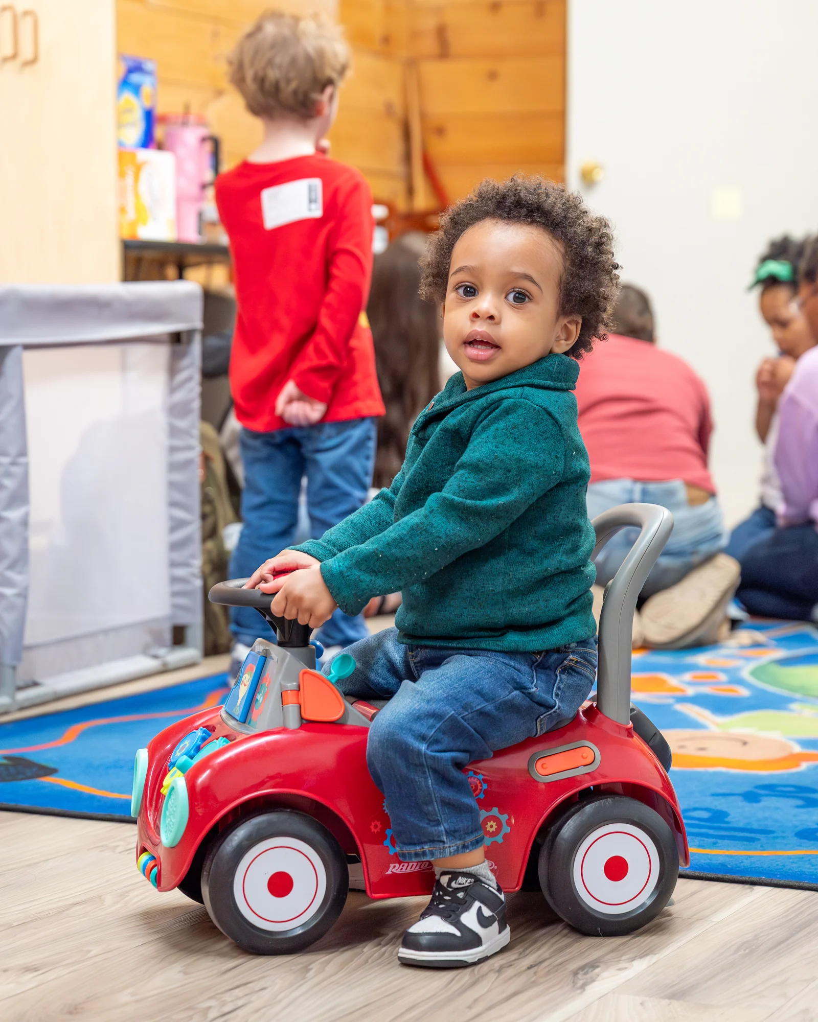 A young child enjoying play in a BCC children’s room